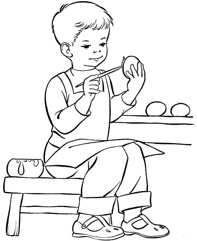 Название: Раскраска Мальчик красит яички к пасхе. Категория: раскраски пасха. Теги: Пасха, яйца, узоры.