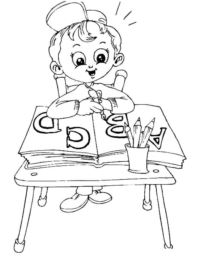 Название: Раскраска Ребенок сидит за партой и учит уроки. Категория: школа. Теги: парта, мальчик, карандашница.